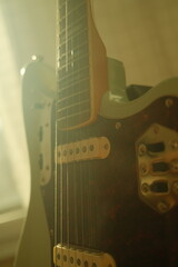 electronic blue guitar, сlose-up of the guitar strings