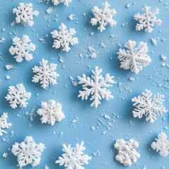 White snowflakes scattered on a light blue background. (1)