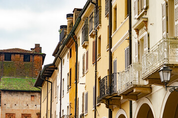 Side view of buildings facades in Mantova, Italy