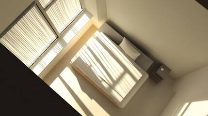 Obraz premium Aerial view of a minimalist bedroom with sunlight streaming through large windows, creating shadows on the floor.