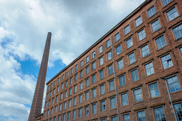 Old industrial building with large Chimney