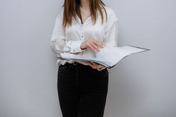 Naklejka premium Figure of an office worker with a laptop, documents and other accounting applications