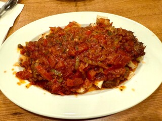 Turkish Halep kebap with bread, in Turkey.