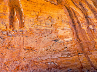 Patterns carved by erosion in the rock wall at Long Canyon in the Grand Staircase-Escalante National Monument, Utah, USA