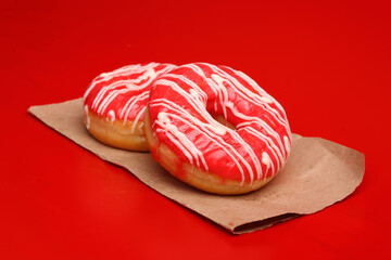 red donuts on a red background