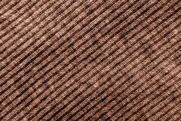 Textured knitted fabric background in mocha mousse color