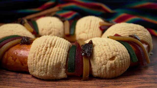 Traditional rosca de reyes magos or bread of the three kings in Mexico, camera from left to right