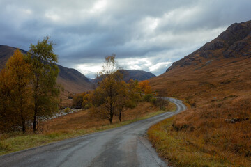 road going through glen etive in glencoe in autumn