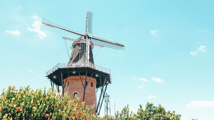 Dutch mill close-up on a beautiful summer day. The dutch mill is located in Holambra, Brazil, a charming city founded by the Dutch immigrants
