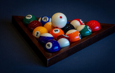 black luxury billiards triangle rack with cue ball and full billiards ball set