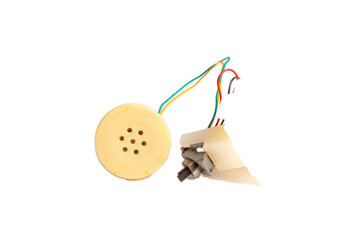 small speaker with wires on a white background