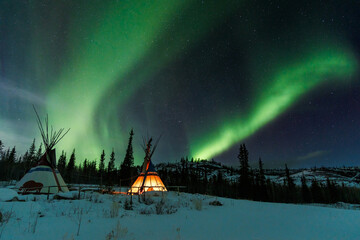 Aurora borealis over the mountains, Yukon, Canada