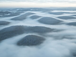 Obraz premium Misty Mountains Enveloped In Soft Winter Fog
