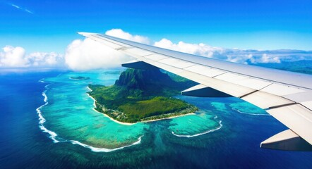 Photo of Island and Ocean from Airplane Window Near the Wing  .