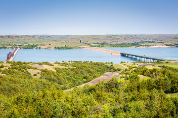 Scenic overlook on bluffs offers views of two Missouri River Bridges in South Dakota: Chamberlain Bridge and Lewis and Clark Memorial Bridge. Missouri River Bridges- Chamberlain SD