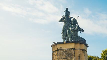 Nusa Dua beach with Arjuna and Kresa statue in Nusa Dua Peninsula park, Bali, Indonesia 