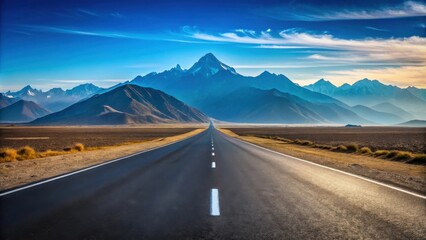 Fototapeta premium Asphalt road vanishing point towards majestic mountain range under a vibrant sky