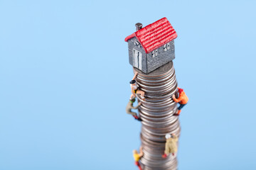 Climbing for the little house at the top of the coin