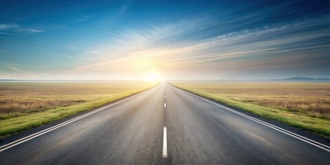 Naklejka premium Asphalt road disappearing into the horizon at sunrise, offering a scenic view of a vast grassy plain