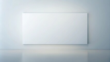 Obraz premium Blank rectangular canvas on a light gray wall in a minimalist interior