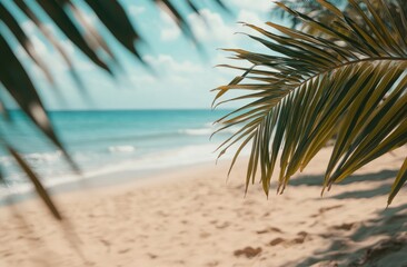 Fototapeta premium A beautiful tropical beach with palm leaves, a sandy shore, and a blurred background featuring ocean waves in the distance, capturing a summer vacation vibe. Ideal for vacation promotions, travel ads