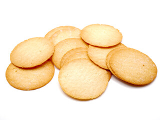 Close-up view of baked potato crisps with golden-brown texture and thin, isolated on a clean white background