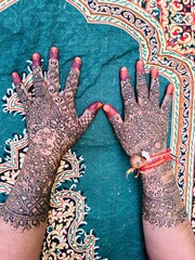 Hands with henna design
