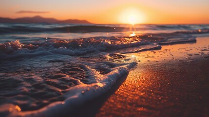 Closeup seaside sand reflecting orange and golden sunset skies, panoramic beach horizon, calm tropical seascape with tranquil summer vibes for relaxing holiday travel