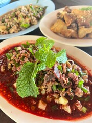 Thai food, strong flavors, spicy, duck salad