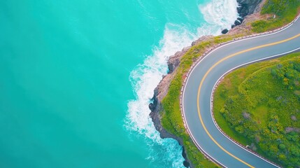 Fototapeta premium A winding coastal road hugging the cliffs, with the vast ocean stretching towards the horizon and crashing waves against the rocks below, showcasing the raw beauty and power of nature.