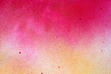 赤色と黄色のスプレー塗料の背景