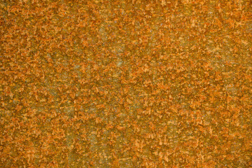 Closeup rust detail in bright orange, as a textured oxidized metal abstract background
