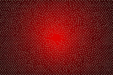 Obraz premium a red background with white dots and a red center