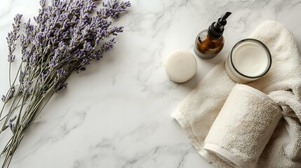 Lavender, soap, candle, towel, and lotion bottle on marble background.