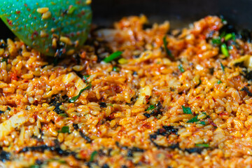 stir-fried rice with spicy sauce after eating streamed seafood