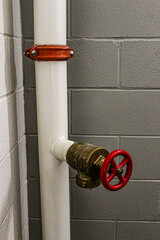 fire hose standpipe system strategy in stairwell with concrete wall background fire safety...