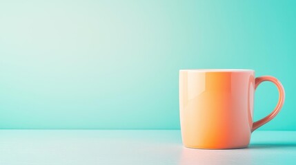 Pastel coffee idea. A vibrant orange mug against a teal background, perfect for coffee or tea lovers.