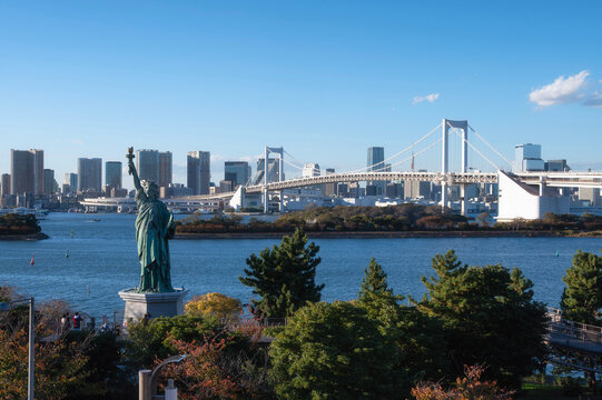 Rainbow bridge and Statue of Liberty in Odaiba, Tokyo, Japan