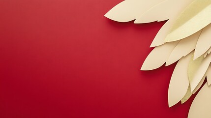 Fototapeta premium Elegant Gold and Cream Leaves on Red Background