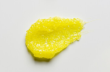 A sample of a cosmetic body care scrub. White background.