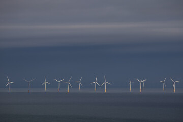 Gwynt y Mor off shore wind farm on horizon © Philip