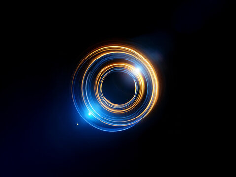 Intricate, glowing concentric circles of blue and gold light spin against a dark background, creating a mesmerizing optical illusion of depth and movement.