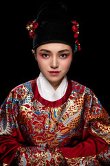 Young woman wearing Ming Dynasty Feiyu clothing on black background