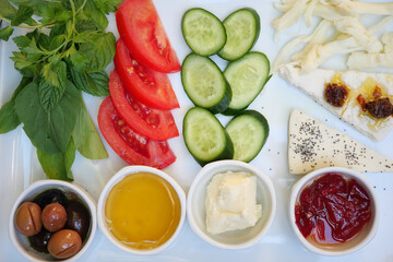Fresh Mediterranean Breakfast Platter with Vegetables and Dips