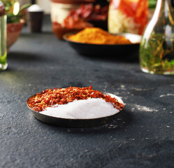 Natural spices and traditional seasonings with dark background