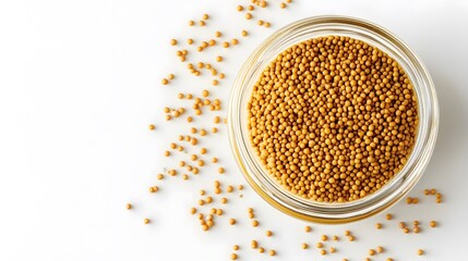 Yellow Mustard Seeds in Glass Bowl on White Background