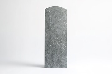 simple gray gravestone with clean design standing upright on minimalistic white background