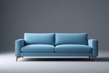 a close up of a blue couch with a wooden frame