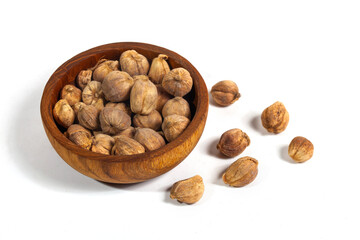A bunch of cardamom (kapulaga) seeds isolated on a white background. In addition to being a flavor enhancer, cardamom is also used as a medicine for coughs, itchy throats, stomach aches, bloating.