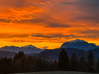 Twilight atmosphere on majestic snow-capped mountain summit Dobratsch in Gailtal Alps seen from Rosental, Carinthia, Austria. Alpine winter wonderland landscape at dawn in serene Austrian Alps